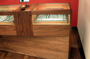 Photograph of custom jewelry display cases and inset wall displays by Townsend Design for Me&Ro Jewelry, Elizabeth St., NYC. Design: SHoP Architects